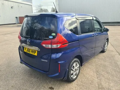 Begagnad Honda Jazz Hybrid 2016 Blå Halvkombi