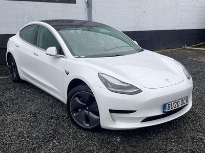 White Used 2020 Tesla Model 3 Standard Range Sedan | £12,995 (A bit pricey)