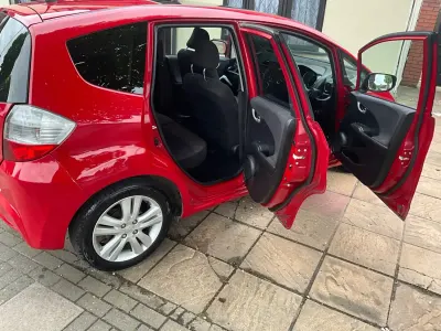 Second-hand Honda Jazz EX 99 CP (72 kW) 2012 Roșu Hatchback