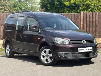 Usado VW Caddy Maxi Life 102 HP (75 kW) 2012 Roxo Monovolume