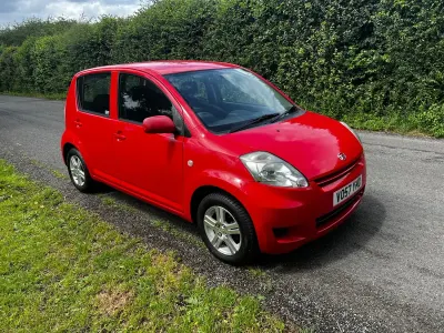 Used Daihatsu Sirion 69 HP (50 kW) 2008 Red Hatchback