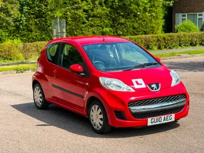 Second-hand Peugeot 107 68 CP (50 kW) 2010 Roșu Hatchback