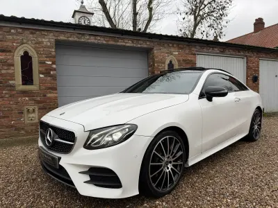 Used Mercedes E220 AMG line 194 HP (142 kW) 2018 White Coupe