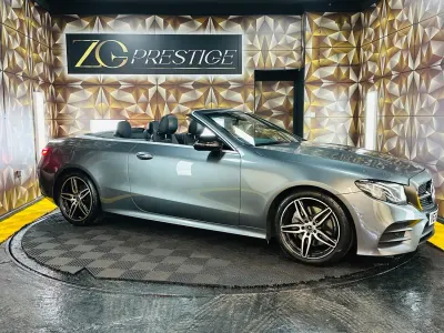Usado Mercedes E220 AMG line 194 HP (142 kW) 2018 Cinzento Cabrios