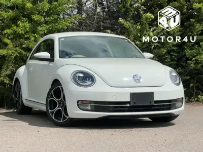 Używany VW Beetle Design 105 KM (77 kW) 2012 Biały Hatchback