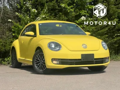 Used VW Beetle Design 105 HP (77 kW) 2015 Yellow Hatchback