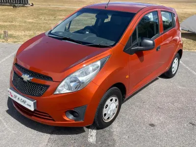 Used Chevrolet Spark 68 HP (50 kW) 2010 Orange Hatchback