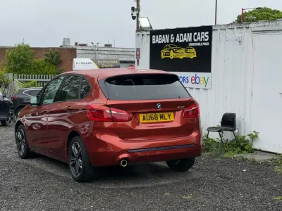 Usado BMW 218 Sport Line 138 CV (101 kW) 2018 Naranja Utilitario