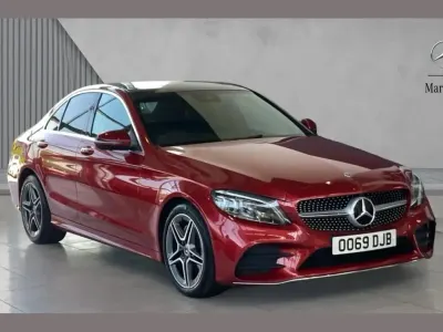 Used Mercedes C220 AMG line 194 HP (142 kW) 2020 Designo hyacinth red metallic Sedan