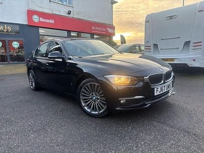 Jet black Used 2017 BMW 330e Luxury Line Sedan | £10,495 (Fair price)