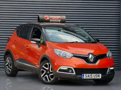 Used Renault Captur Dynamique 90 HP (66 kW) 2015 Orange/black SUV