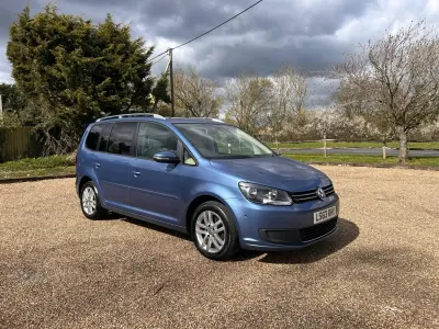 Begagnad VW Touran SE 105 HK (77 kW) 2013 Blå Minibuss