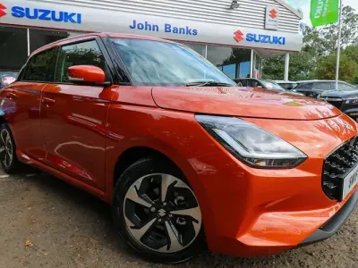 Used Suzuki Swift 82 HP (60 kW) 2026 Flame orange pearl metallic Hatchback