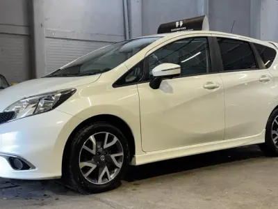 Używany Nissan Note Tekna 90 KM (66 kW) 2014 Biały Hatchback