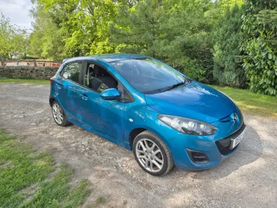 Usado Mazda 2 First 2012 Azul Utilitario