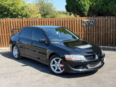 Used Mitsubishi Lancer 261 HP (191 kW) 2004 Black Sedan