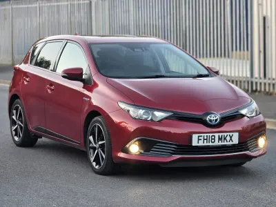 Used Toyota Auris Hybrid Design 136 HP (100 kW) 2018 Red Hatchback