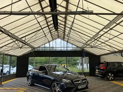 Used Mercedes E220 AMG line 194 HP (142 kW) 2019 Blue Coupe