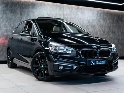 Begagnad BMW 218 Luxury Line 2015 Svart Halvkombi