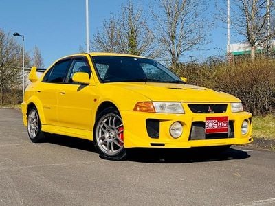 Used Mitsubishi Lancer Evolution 280 HP (205 kW) 1998 Yellow Sedan