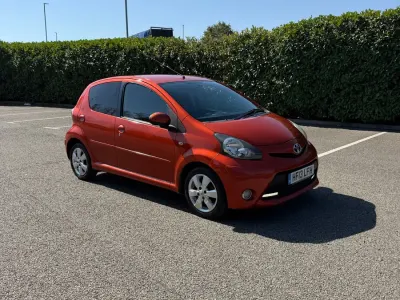 Used Toyota Aygo 68 HP (50 kW) 2013 Orange Hatchback