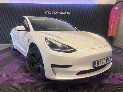 White Used 2020 Tesla Model 3 Standard Range Sedan | £13,995 (A bit pricey)