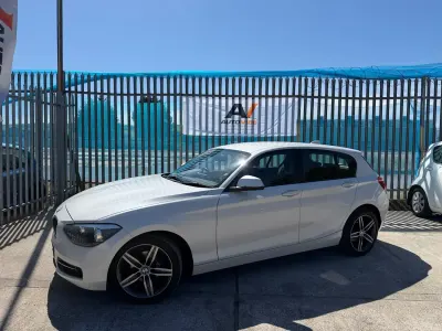 Begagnad BMW 116 Sport Line 2014 Vit Halvkombi