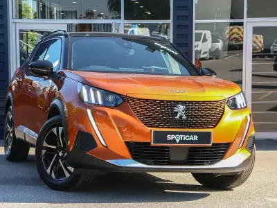 Used Peugeot e-2008 GTi 100 kW (136 HP) 2023 Orange SUV