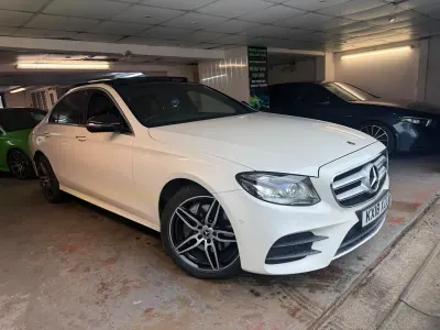 Used Mercedes E220 AMG Line Premium Plus 194 HP (142 kW) 2018 White Sedan