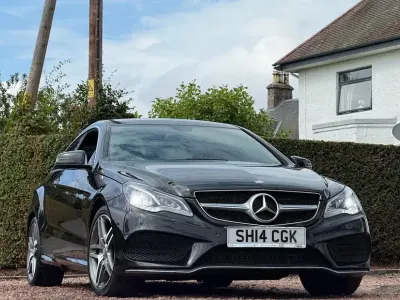 Used Mercedes E220 AMG 170 HP (125 kW) 2014 Black Coupe