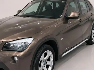 Used BMW X1 Comfort Edition 140 HP (102 kW) 2010 Bronze SUV