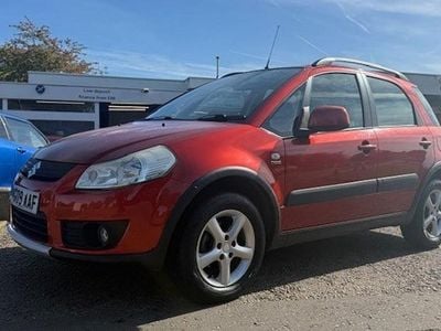 Orange Used 2009 Suzuki SX4 Hatchback | £999 (Good price)