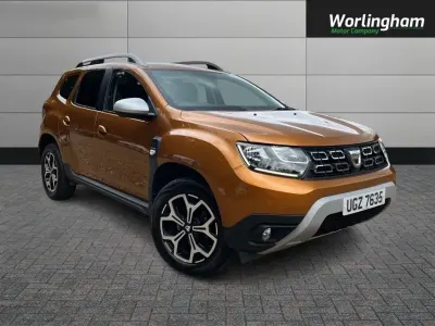 Używany Dacia Duster Prestige 115 KM (84 kW) 2021 Pomarańczowy SUV