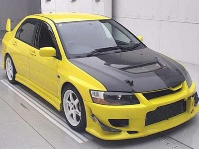 Used Mitsubishi Lancer 276 HP (202 kW) 2003 Yellow Sedan