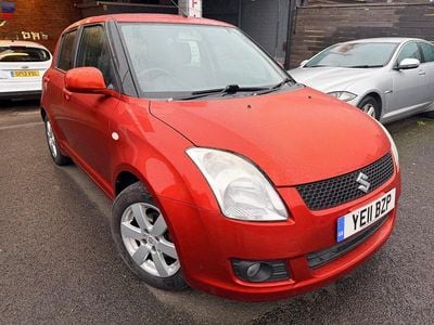 Used Suzuki Swift SZ4 101 HP (74 kW) 2011 Orange Hatchback