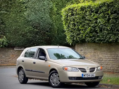 Used Nissan Almera S 116 HP (85 kW) 2004 Gold Hatchback