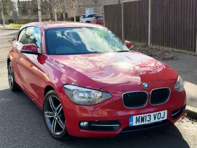 Begagnad BMW 116 Sport Line 2013 Röd Halvkombi