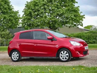 Usado Mitsubishi Mirage 79 HP (58 kW) 2014 Vermelho Citadino