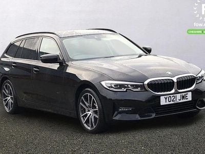 Black Used 2021 BMW 330e Sport Line Estate | £19,599 (Fair price)