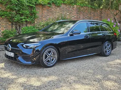 Used Mercedes C200 AMG line 204 HP (150 kW) 2022 Black Estate