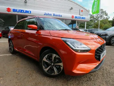 Used Suzuki Swift 82 HP (60 kW) 2026 Flame orange pearl metallic Hatchback