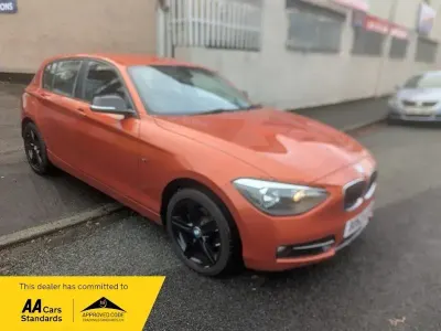 Usado BMW 116 Sport Line 2013 Naranja Utilitario