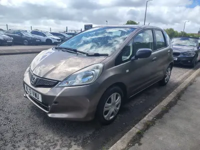 Used Honda Jazz S 90 HP (66 kW) 2013 Brown Hatchback