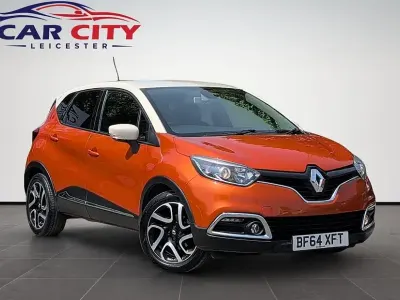 Used Renault Captur Dynamique 90 HP (66 kW) 2014 Orange/cream SUV