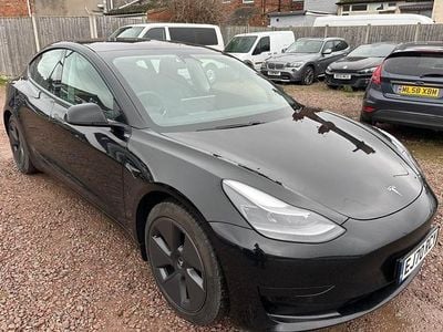 Black Used 2020 Tesla Model 3 Standard Range Sedan | £11,985 (A bit pricey)