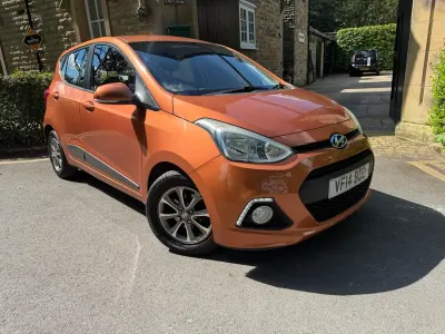 Usado Hyundai i10 Premium 83 HP (61 kW) 2014 Laranja Citadino