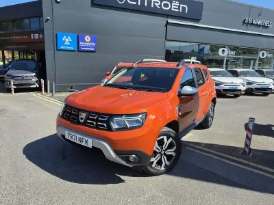Second-hand Dacia Duster Prestige 113 CP (83 kW) 2021 Portocaliu SUV