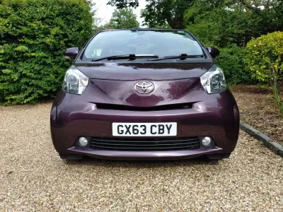 Used Toyota iQ 68 HP (50 kW) 2013 Amethyst pearl Hatchback