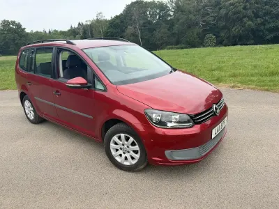 Used VW Touran S 105 HP (77 kW) 2011 Red MPV