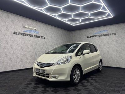 Begagnad Honda Jazz Hybrid 102 HK (75 kW) 2013 Vit Halvkombi